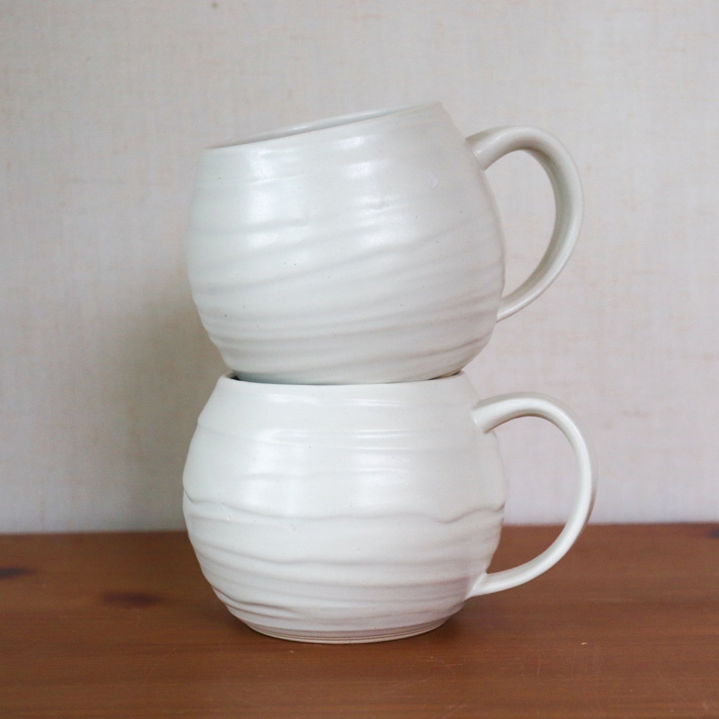 Glossy White Textured Mugs