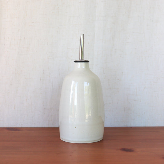 Oil Bottle In Cream