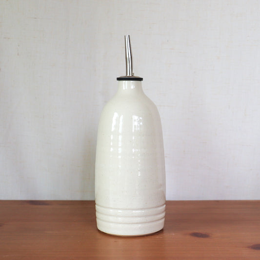 Oil Bottle In Cream