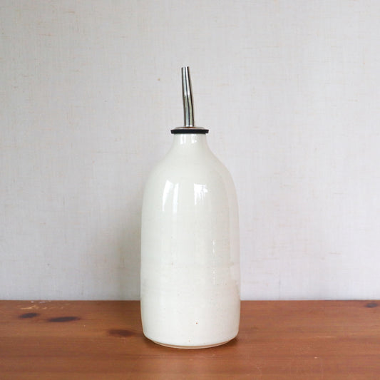 Oil Bottle In Cream