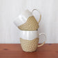Carved White and Tan Mug
