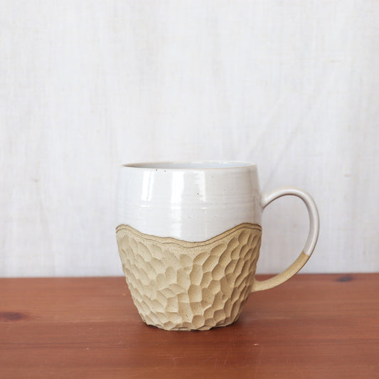 Carved White and Tan Mug